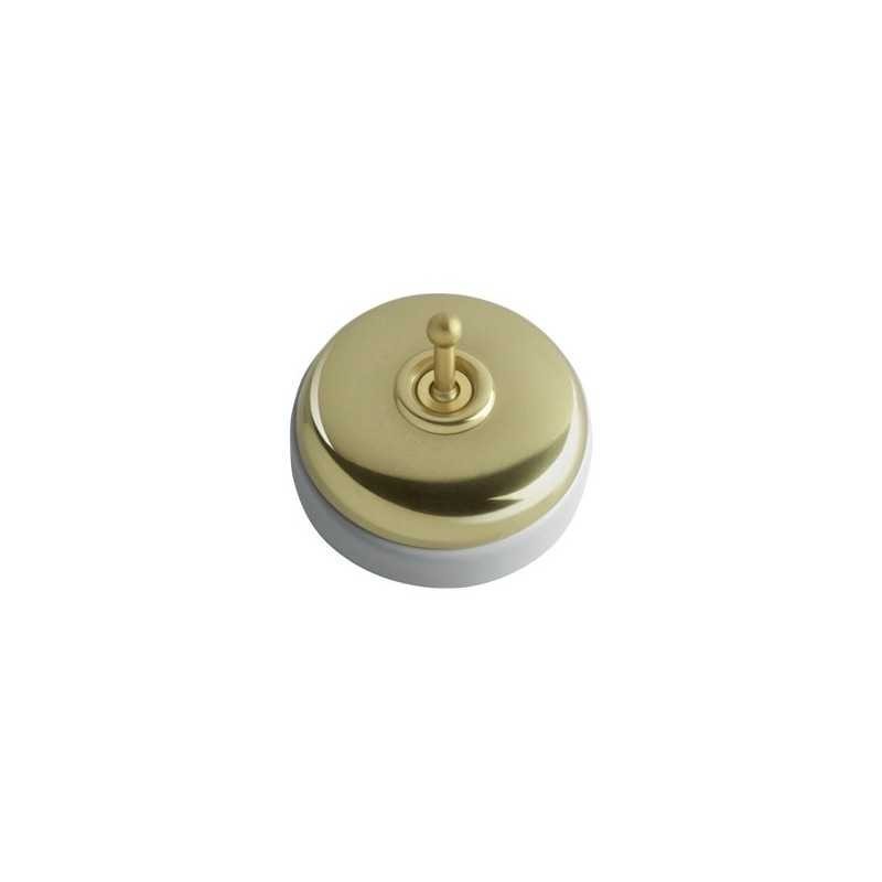 Conmutador porcelana superficie modular dorado latón