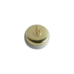Conmutador porcelana superficie modular dorado latón